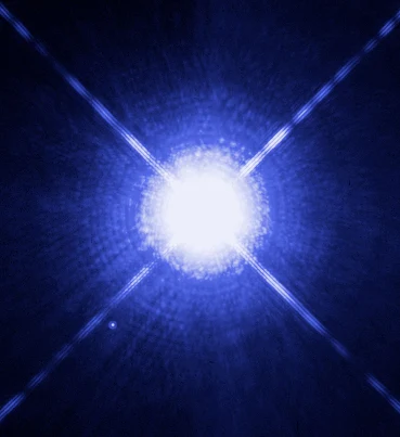 Astronomieaufnahme des Sirius-Systems — Sirius A als heller Stern, Sirius B als kleiner weißer Punkt links darunter
